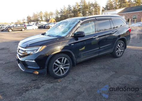 2016 Honda Pilot Touring z USA, uszkodzony, nr VIN 5FNYF6H97GB074356